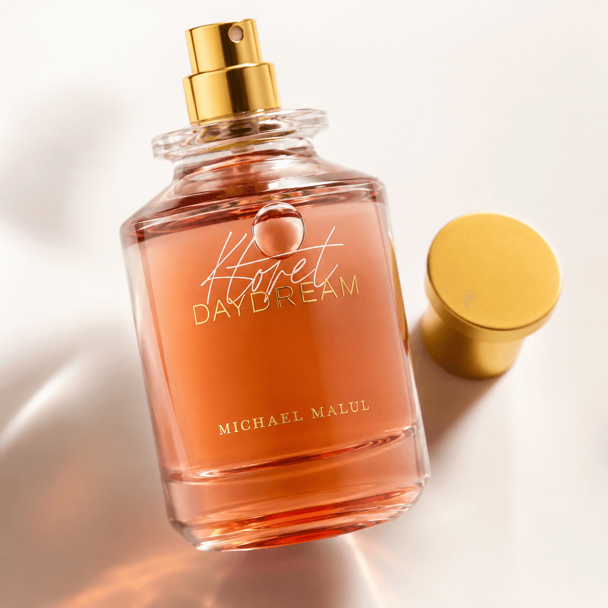 Michael Malul Ktoret Daydream women's fragrance styled in a radiant floral perfume presentation
