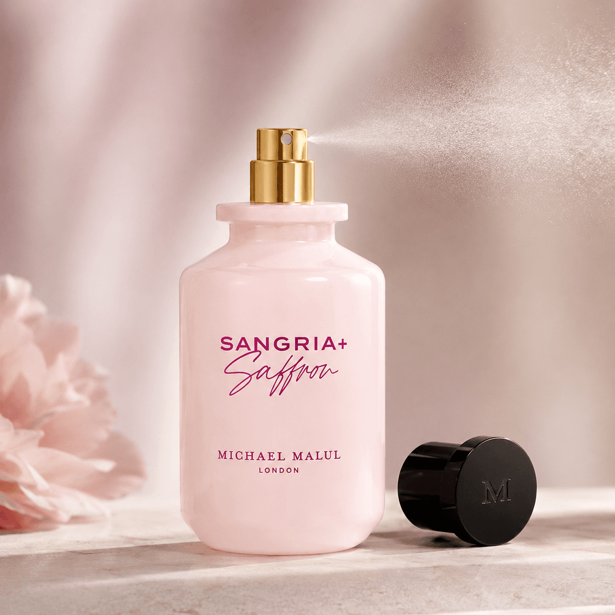 Michael Malul Sangria+Saffron women's fragrance styled in a warm saffron perfume presentation
