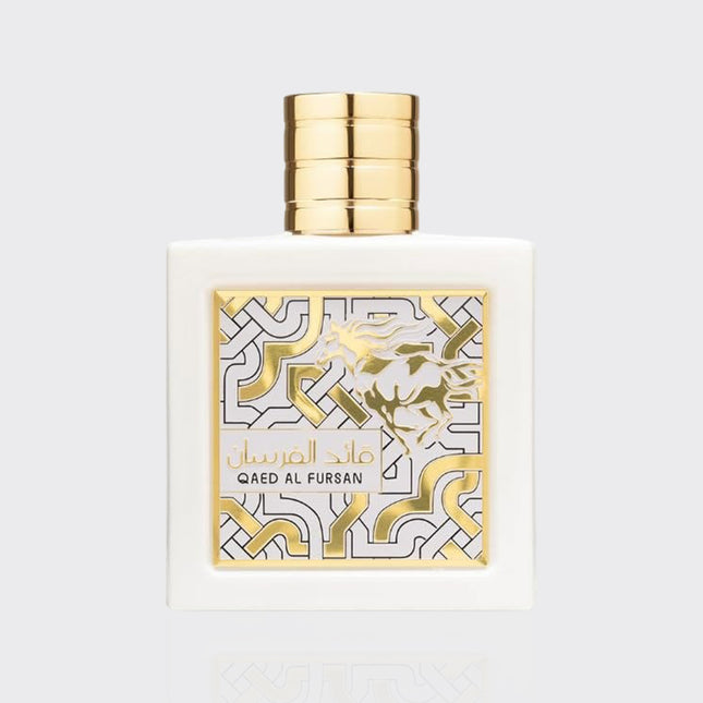 Perfume bottle with gold and white design on a light gray background