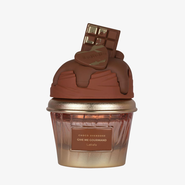 Cupcake-shaped container with chocolate design on a white background