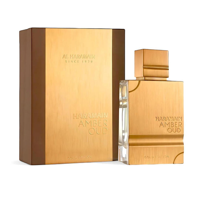 Gold Haraamain Amber Oud perfume bottle and packaging on a white background