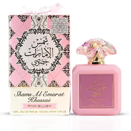 Shams Al Emarat Khususi Pink Blush perfume bottle and packaging on a white background