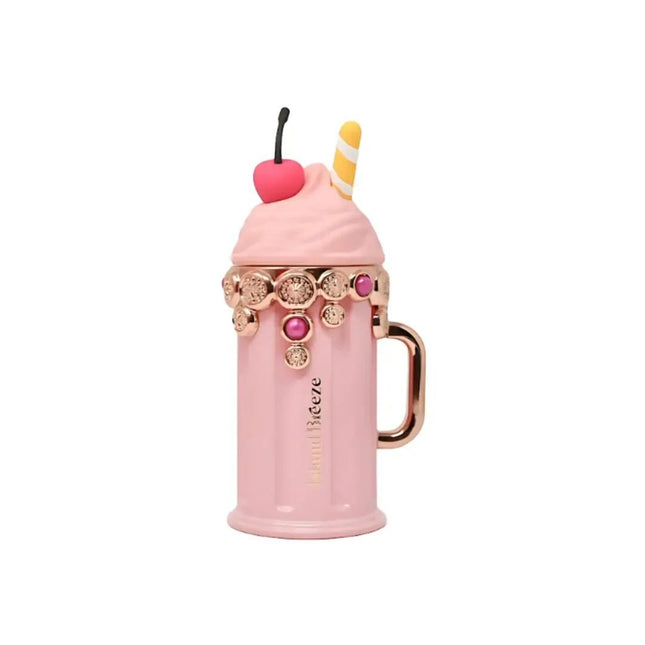 Pink mug with ice cream cone and cherry decoration on a white background