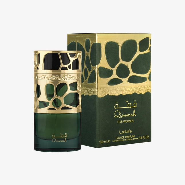 Green and gold perfume bottle with packaging on a white background