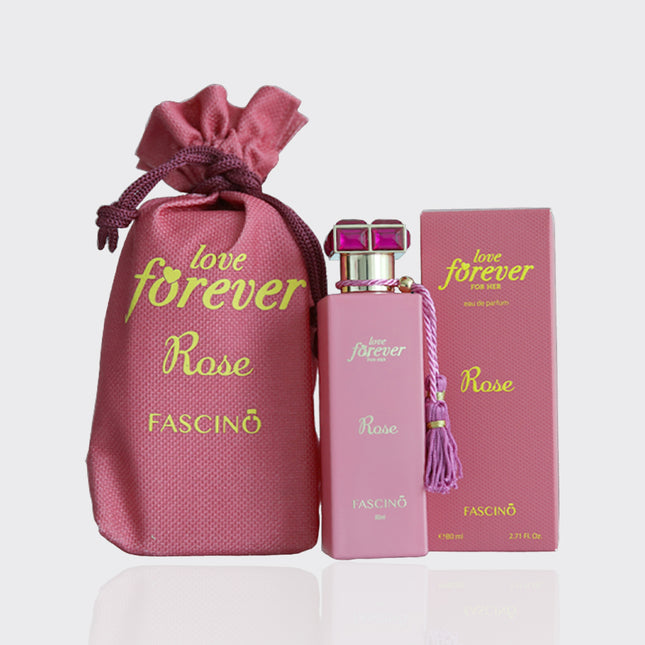 Fascino 'Love Forever Rose' perfume set with pink bag, bottle, and box on a light gray background