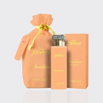 Fascino perfume set with bottle, packaging, and drawstring bag on a light gray background