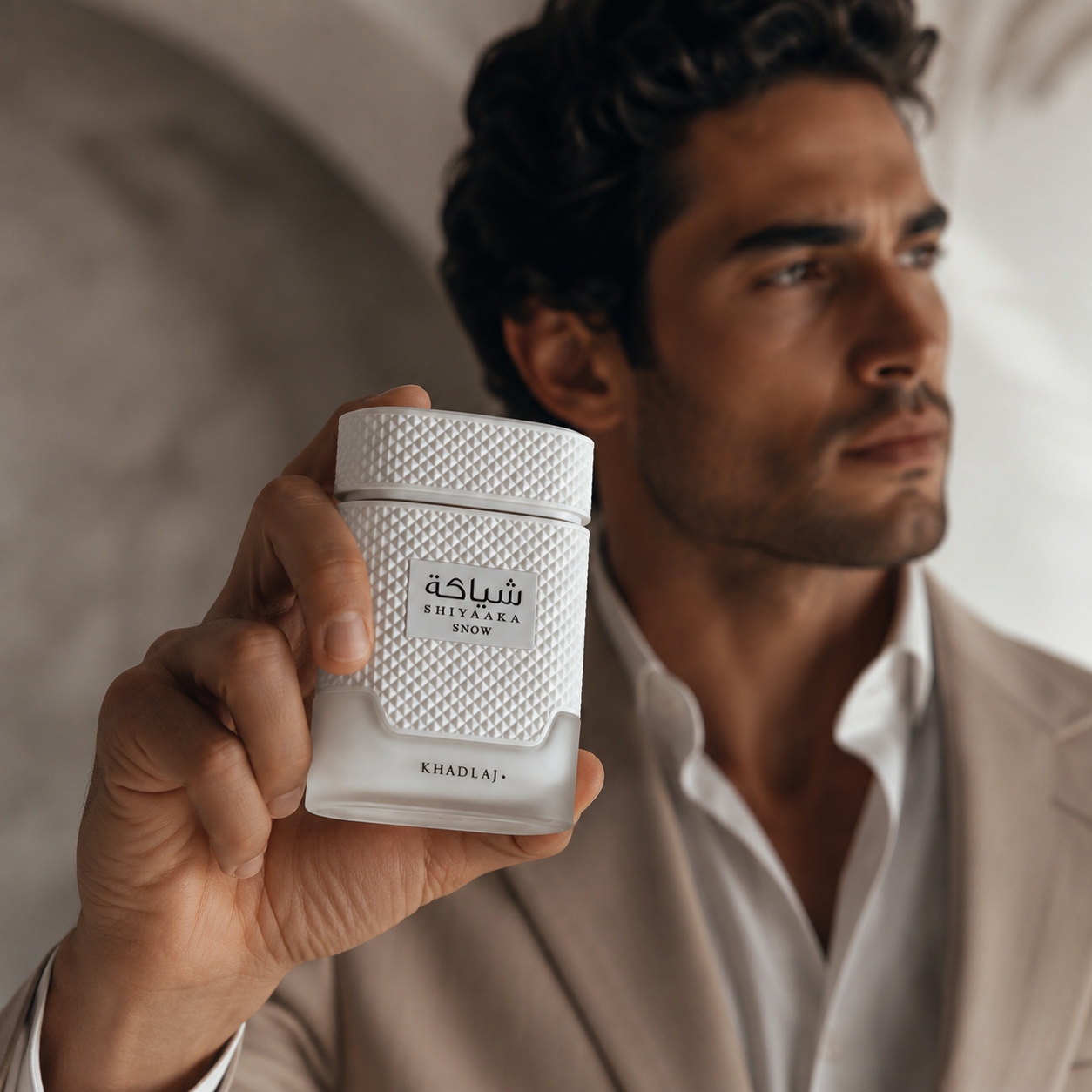 Khadlaj Shiyaaka Snow men's perfume in a crisp citrus fragrance setting