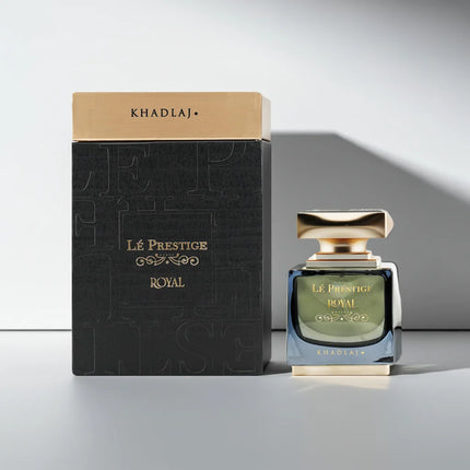 Perfume bottle and packaging with 'Khadlaj' branding on a light gray background