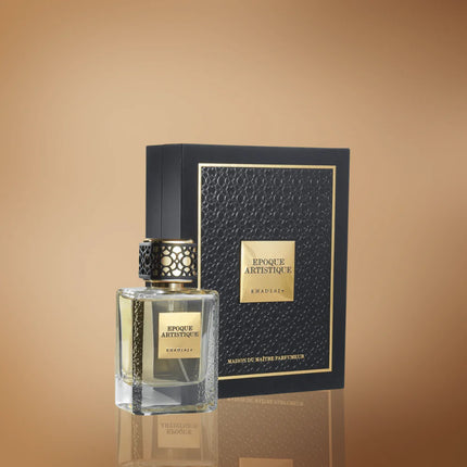 Perfume bottle and packaging with 'Epoque Artistique' branding on a reflective surface.