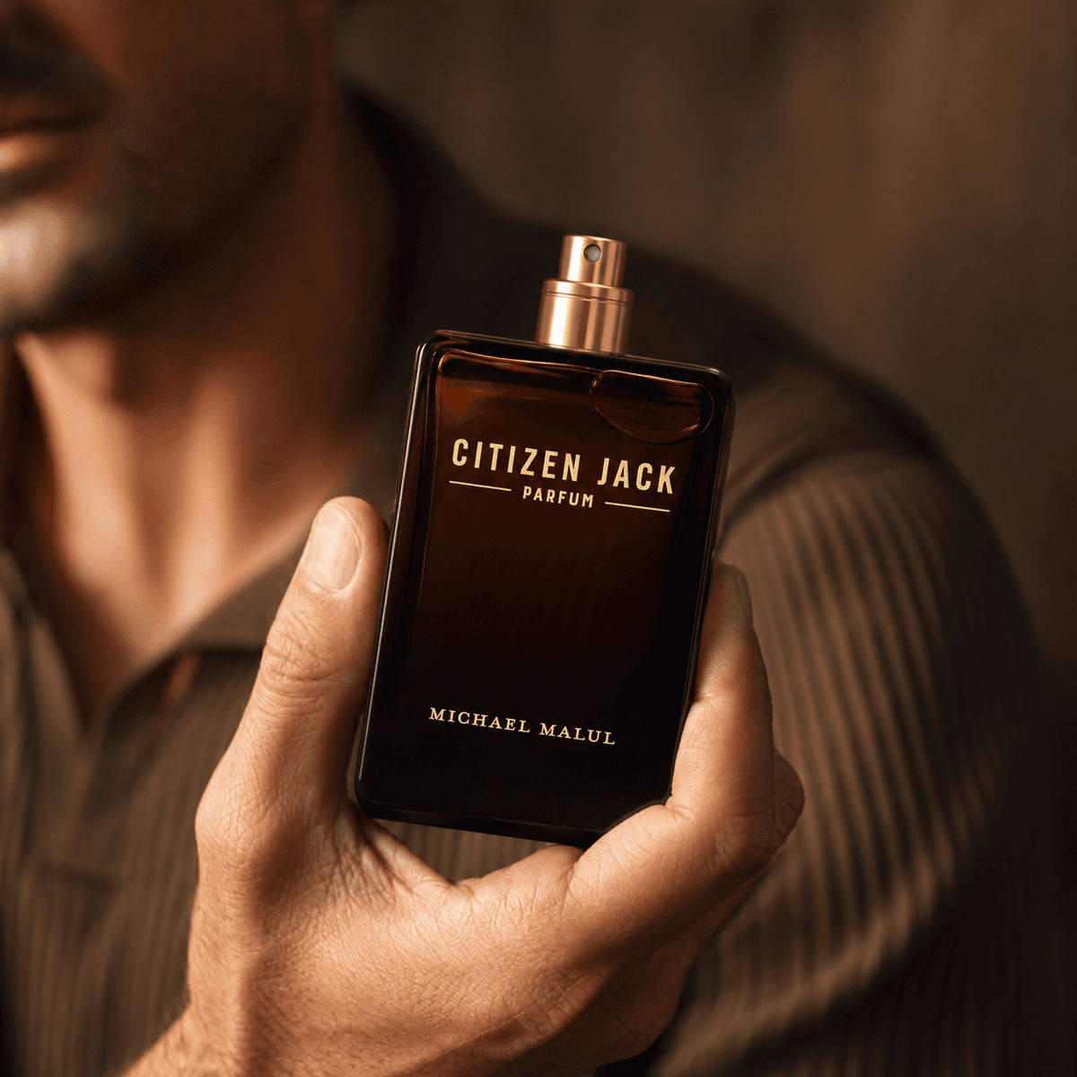 Michael Malul Citizen Jack Parfum men's fragrance in a polished evening setting