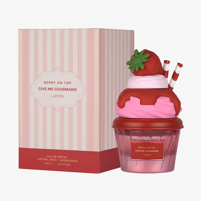 Strawberry-themed perfume bottle with packaging on a white background